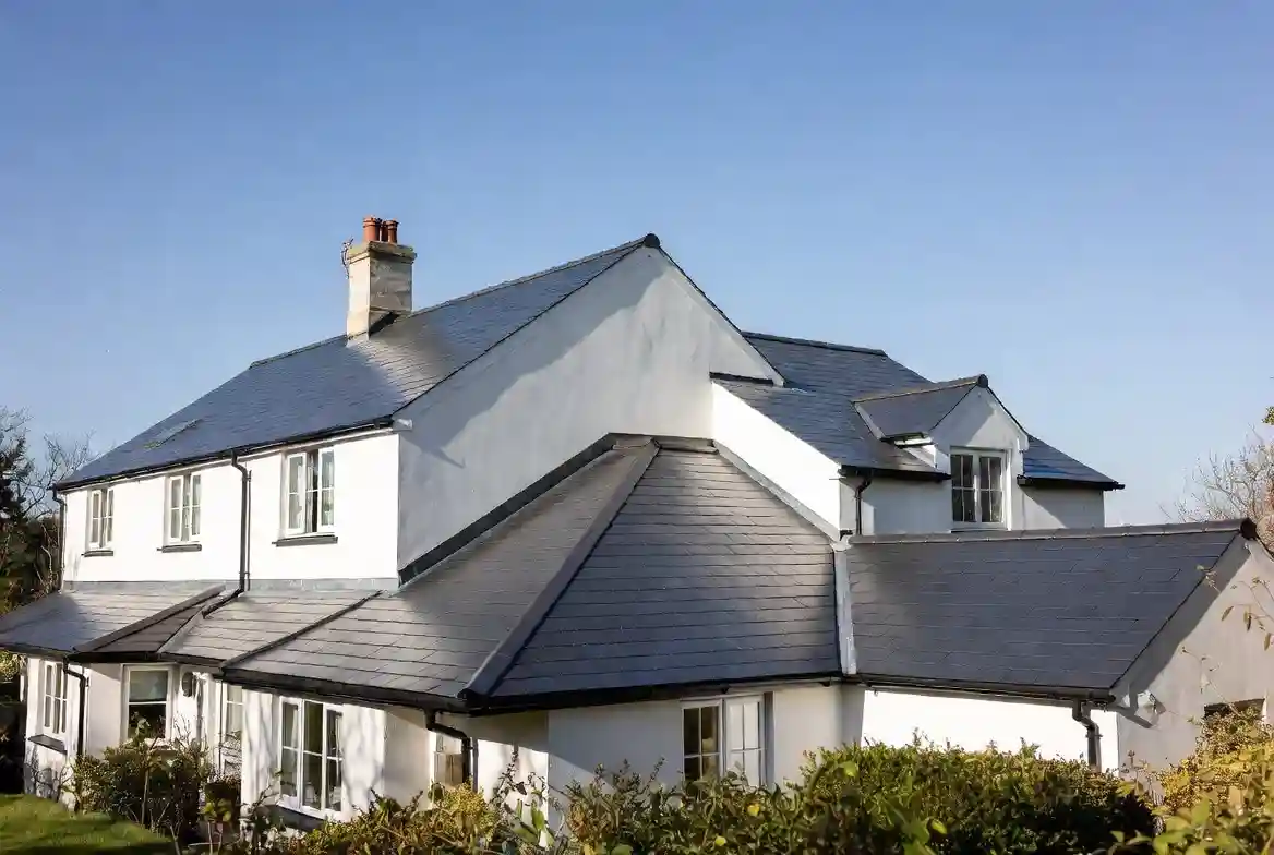 Full re-roof with natural slate tiles and lead flashings in Wilmslow